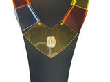 multicolored glass necklace on a black mannequin with a gold clasp