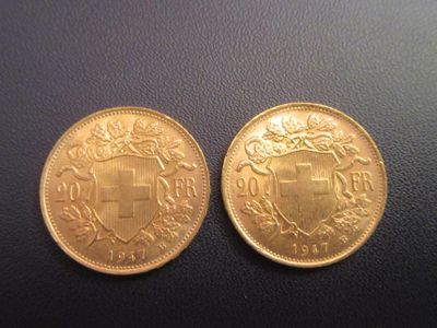 deux pièces d'or sur lesquelles figure un blason