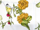 a picture of a table cloth with a butterfly and flowers on it