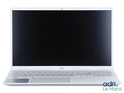 the dell laptop is open and ready to be used