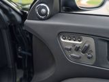 a close up of a car ' s interior with the door open