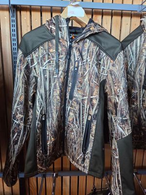 a close up of two jackets on a rack in a store