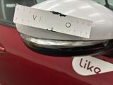 a close up of a mirror with a sticker on it