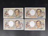 four pieces of paper with a picture of a man on it