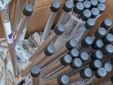 a box with a bunch of baseball bats in it
