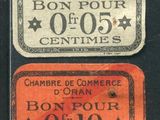 deux étiquettes représentant l'ancienne et la nouvelle monnaie française sur un fond noir