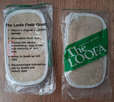 two bags of rice sitting on a wooden table
