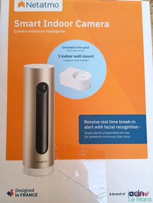 a box with a picture of a smart indoor camera