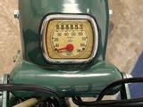 a close up of a motorcycle with a speedometer on it