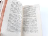 an open book that is sitting on top of a table