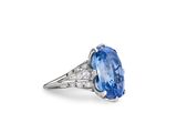 an oval blue sapphire and diamond ring