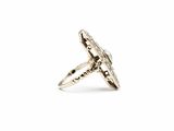 a close up of a silver ring on a white background