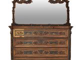 an image of a dresser with a mirror on top of it