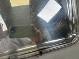 a man taking a picture of himself in a mirror