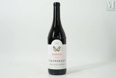 a bottle of wine that is sitting on a table