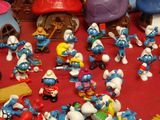 a lot of smurfs that are on the table
