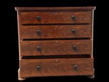 a wooden chest of drawers with four drawers on each side