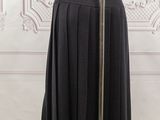 black pleated skirt on a mannequin mannequin mannequin mannequin mannequin mannequin mannequin mannequin manne
