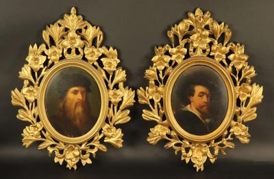 deux portraits encadrés représentant un homme barbu et une femme barbue