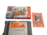 a box with a game on it next to a box with a card