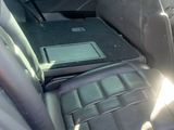 a laptop in the back seat of a car