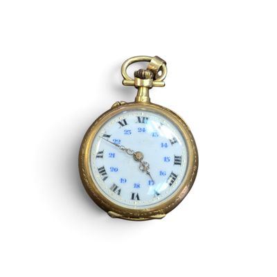 une montre de poche en or avec des chiffres romains