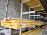 several pieces of wood are stacked on top of each other in a warehouse