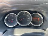 three gauges on the dashboard of a car