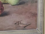a painting of a pomegranate and a pear on a table