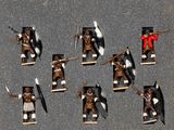 de nombreuses figurines représentant des hommes vêtus de costumes médiévaux