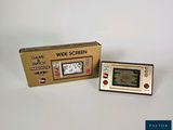 a small electronic device that is sitting next to a box