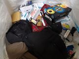 a pile of items in a plastic bag on the floor