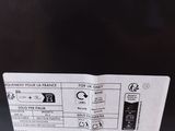 a picture of the back of a dishwasher with a label on it