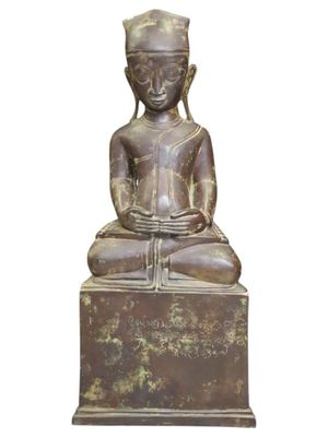 an image of a statue of a person sitting on a box
