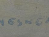 a close up of a sign on a concrete surface