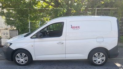 a white van that is parked in a parking lot