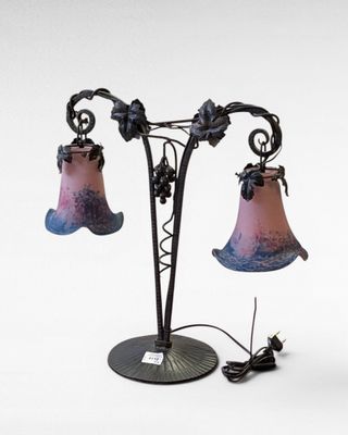a lamp that is sitting on a table next to a mouse
