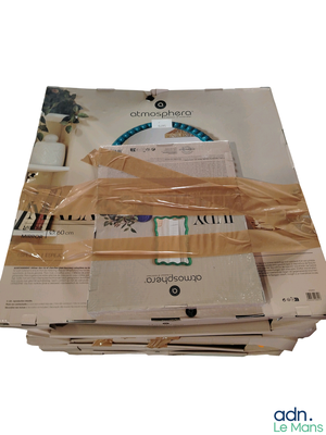 a stack of boxes that are wrapped up and stacked on top of each other