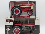 an image of a red and white toy tractor in a box