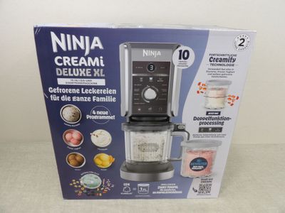 packaging of a blender with a blender in it sitting on a table