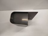 a metal shelf on the wall above the toilet