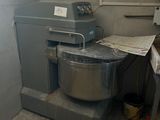 an image of a kitchen with a mixer in the corner