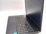 a black laptop computer sitting on a white table