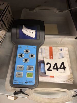 a box with a remote control and a box with other items