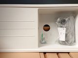a white box with a toothbrush inside of it