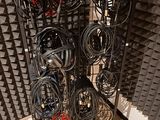 a rack with many wires on it in a room