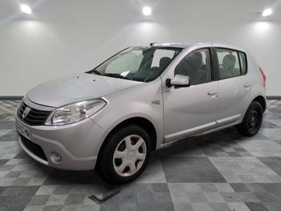 a picture of a silver car parked in a garage