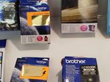 many different types of ink cartridges on the table