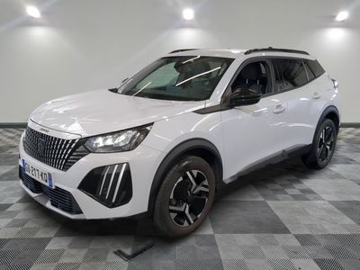 the white suv is parked on a checkered floor in a garage