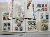 an open book with a lot of stamps on it